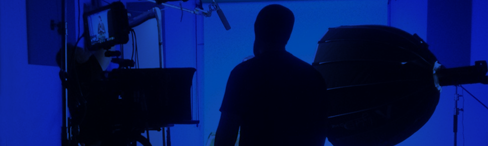  Person surrounded by video and audio recording equipment being recorded